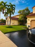 18431 NW 18TH Street, Pembroke Pines, FL 33029 Stucco exterior with a tile roof, mature palm trees, a well-maintained lawn, and a paved driveway