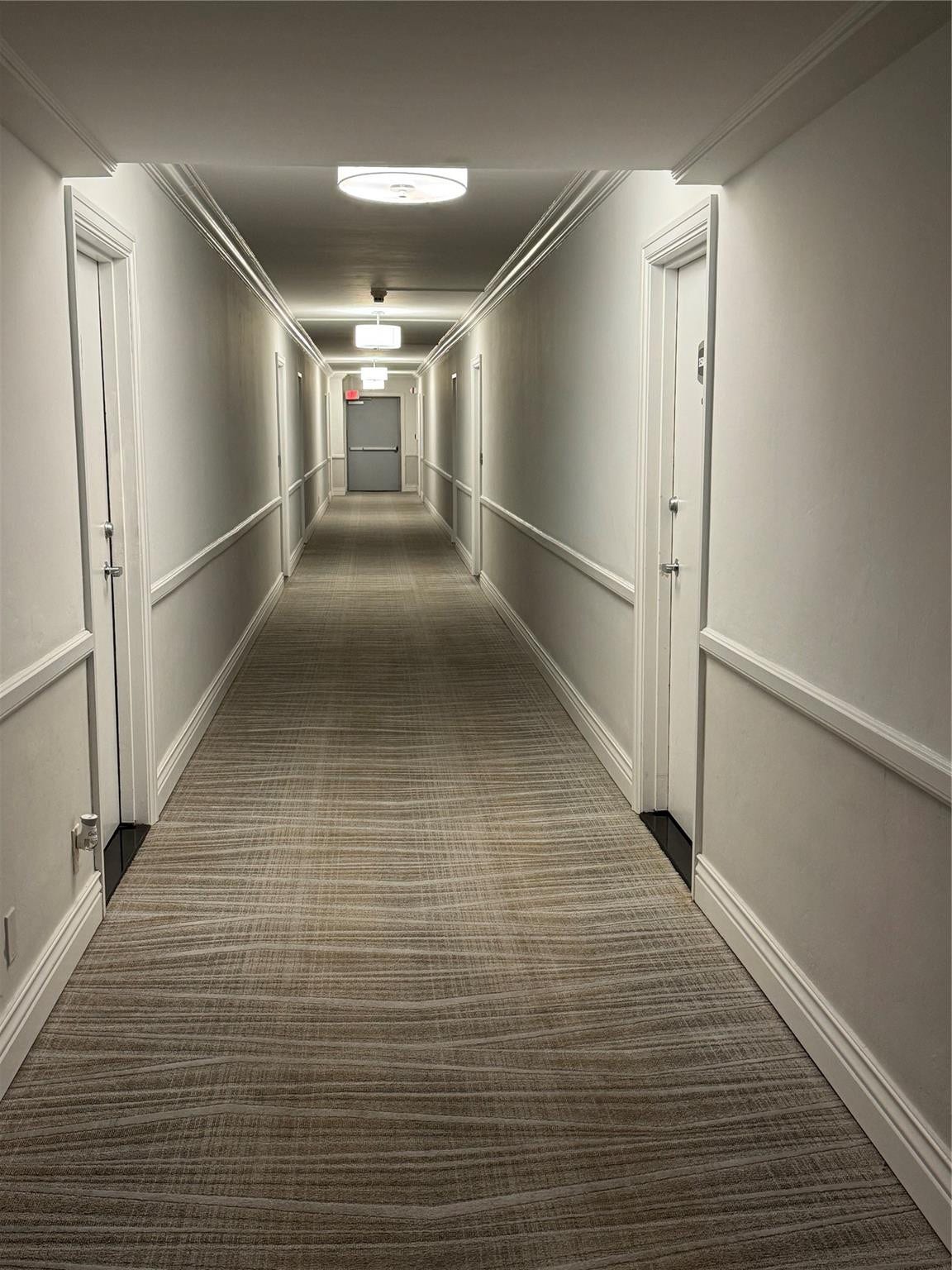 3800 GALT OCEAN Drive, #1508, Fort Lauderdale, Fort Lauderdale, FL 33308 Hallway featuring patterned carpeting, recessed ceiling lighting, crown molding, and wainscoting
