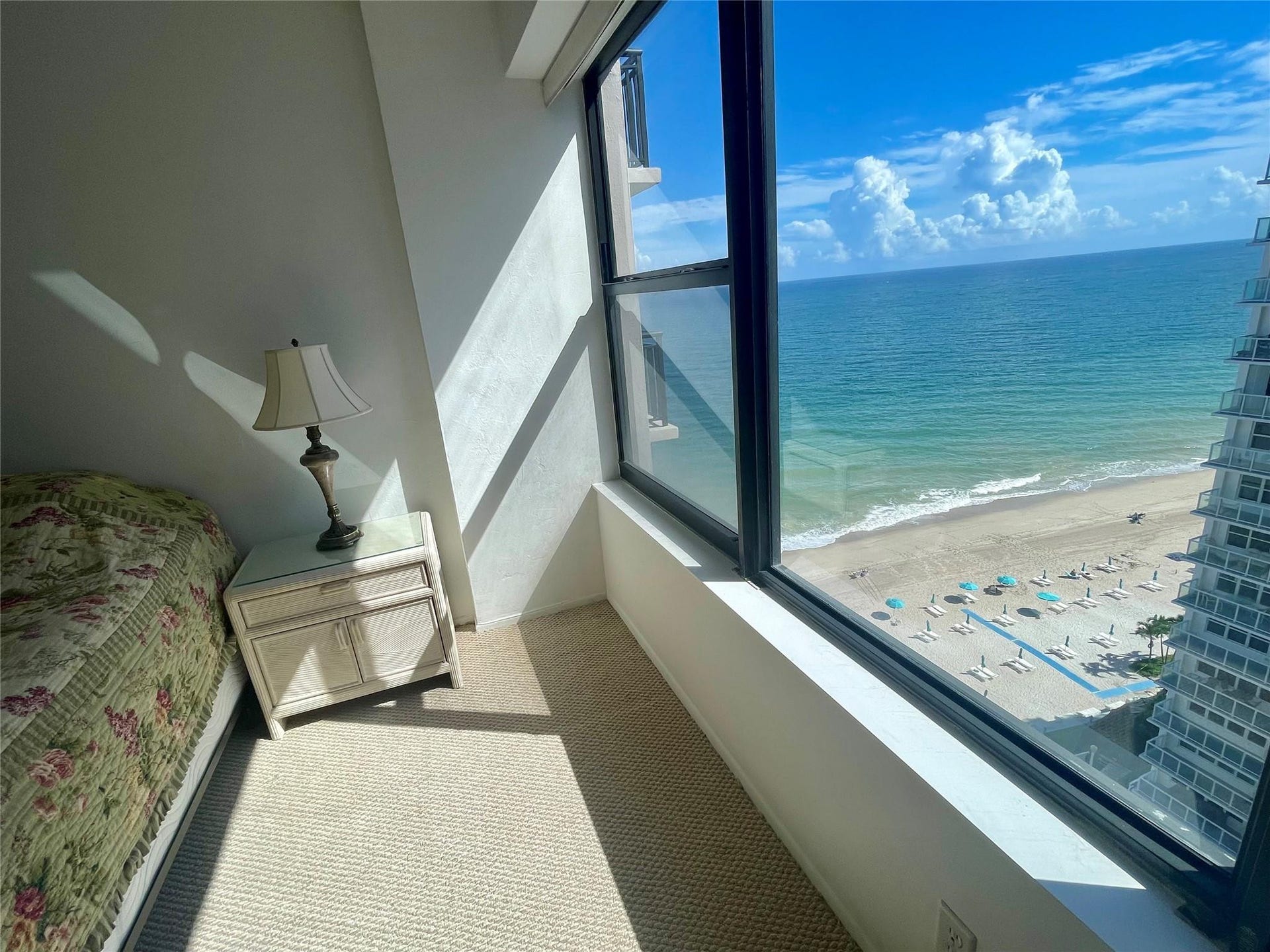 3800 GALT OCEAN Drive, #1508, Fort Lauderdale, Fort Lauderdale, FL 33308 Floor-to-ceiling windows with a serene ocean and beach backdrop