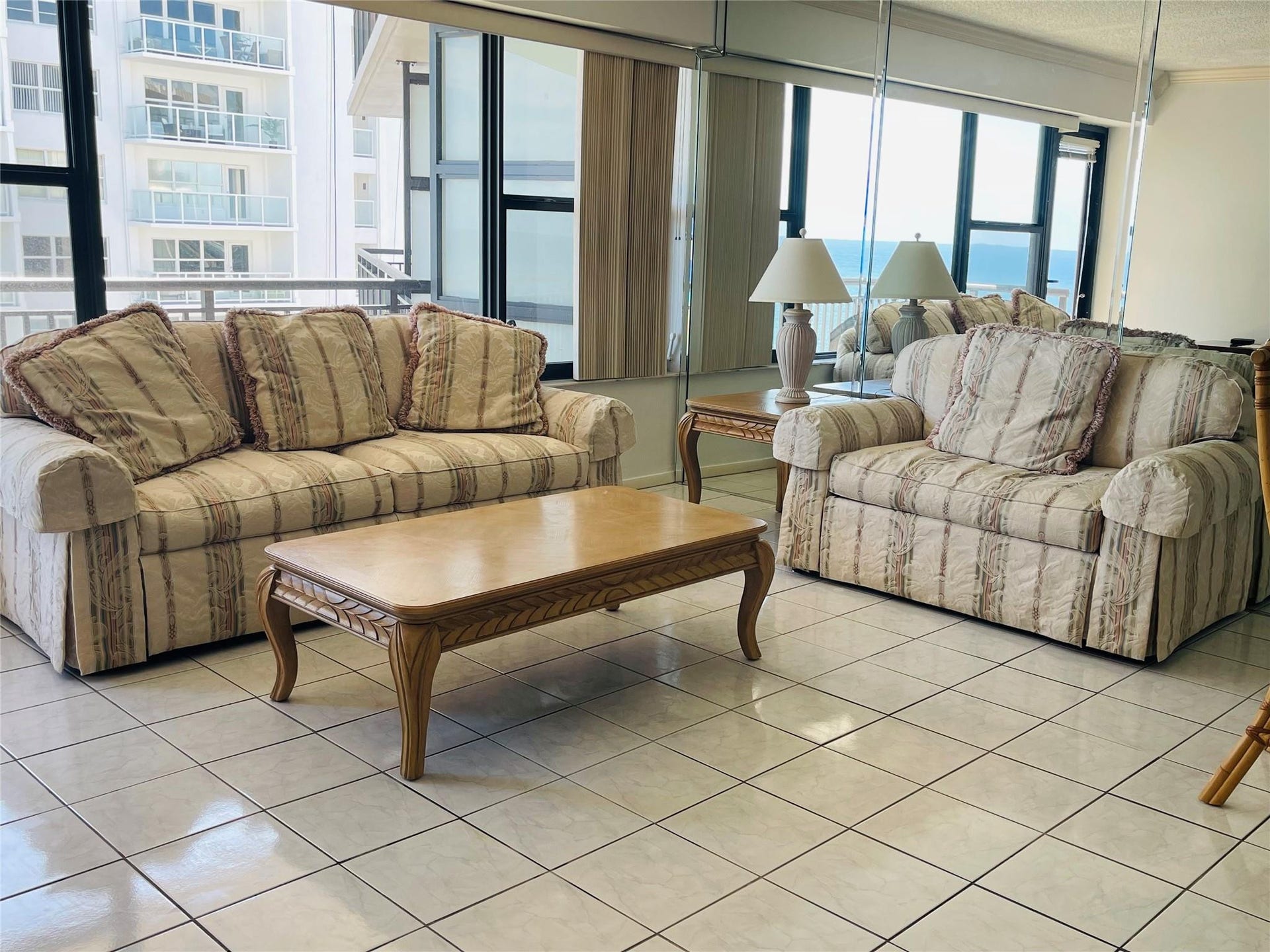 3800 GALT OCEAN Drive, #1508, Fort Lauderdale, Fort Lauderdale, FL 33308 Expansive windows offering water scenery, tiled flooring, mirrored wall, and vertical blinds