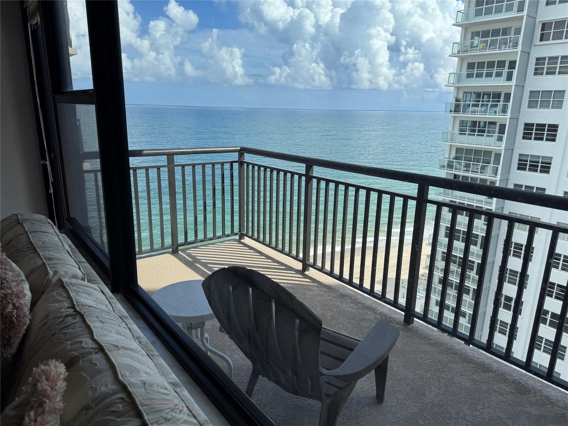 3800 GALT OCEAN Drive, #1508, Fort Lauderdale, Fort Lauderdale, FL 33308 Private balcony with a metal railing and concrete flooring overlooking the ocean and sandy coastline