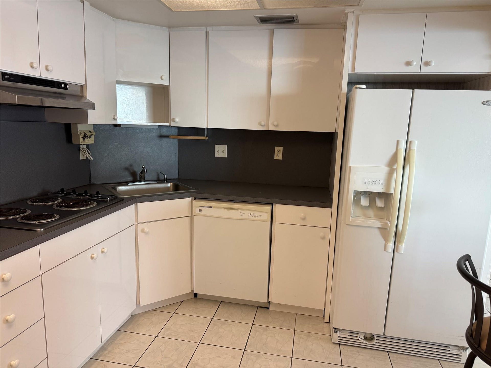 3800 GALT OCEAN Drive, #1508, Fort Lauderdale, Fort Lauderdale, FL 33308 Kitchen featuring white cabinetry, a stainless steel sink, tile flooring, a built-in range, and a side-by-side refrigerator