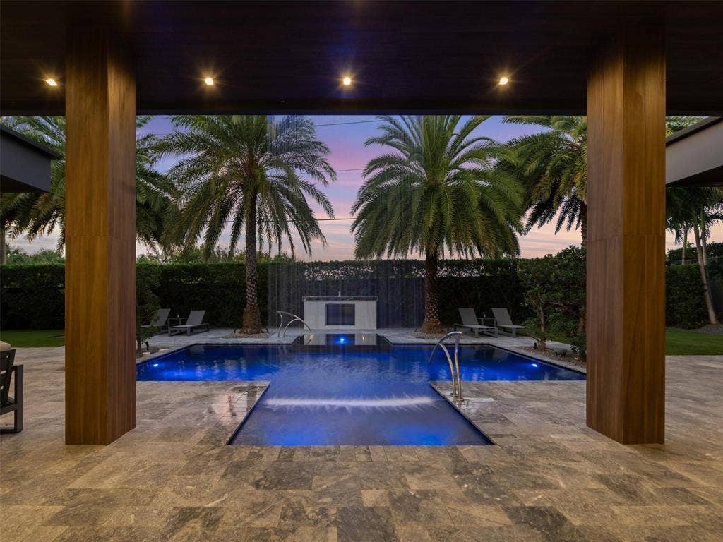 2213 NE 37TH Drive, Fort Lauderdale, FL 33308 pool waterfall night 1
