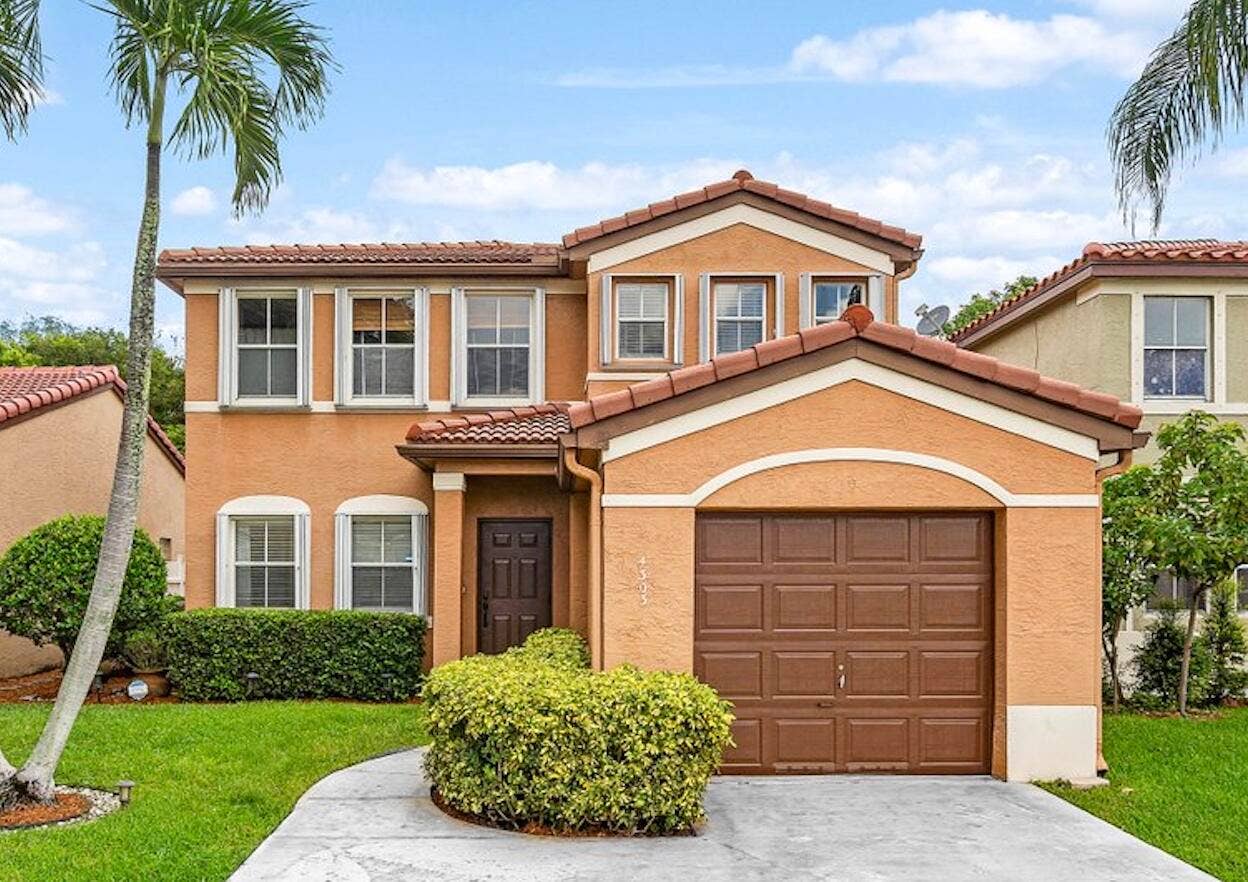 4303 NW 1ST Drive, Deerfield Beach, FL 33442 1 Drive Front of House