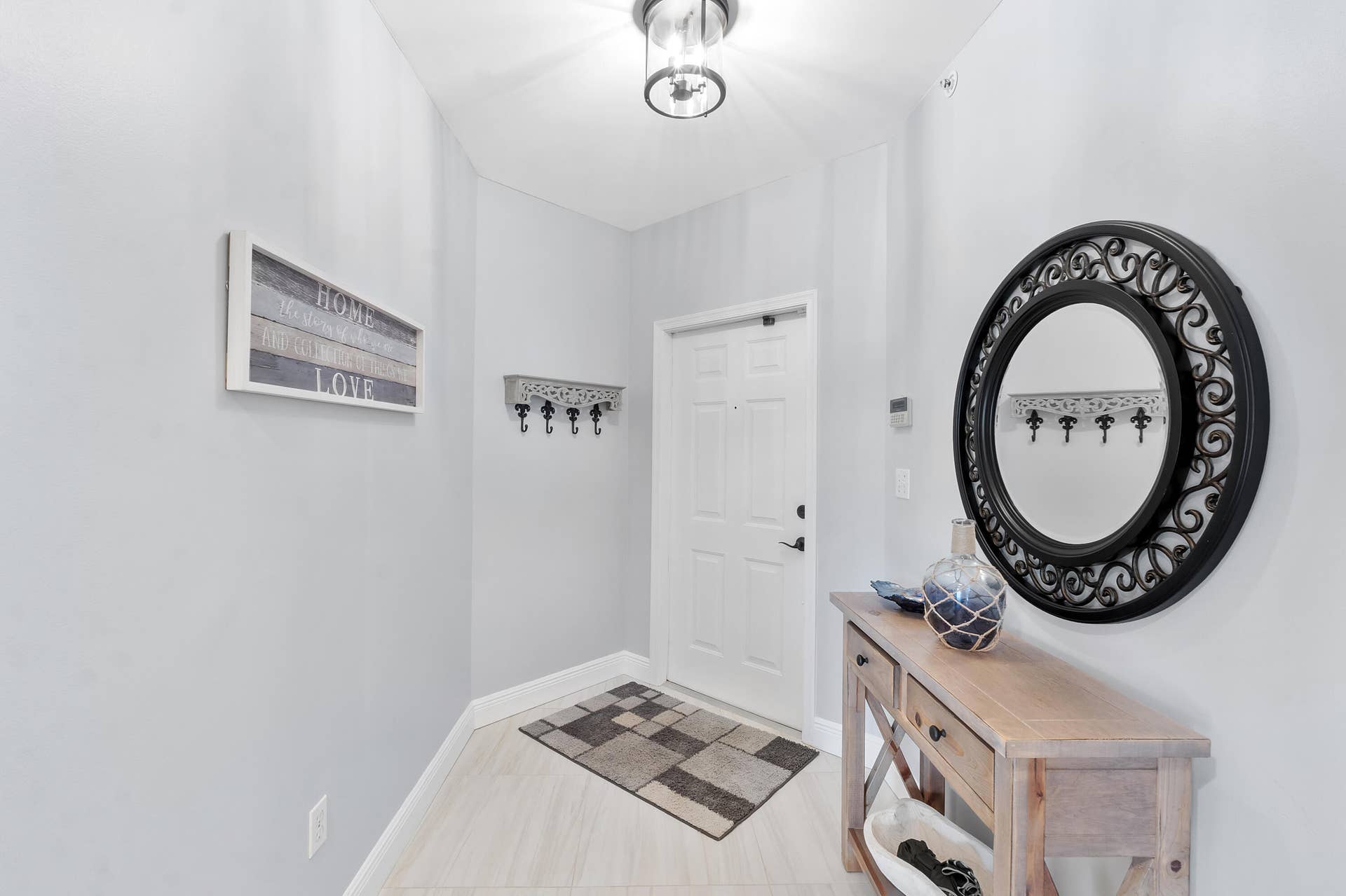 800 Uno Lago Drive, #204, Juno Beach, FL 33408 Interior Entrance 2
