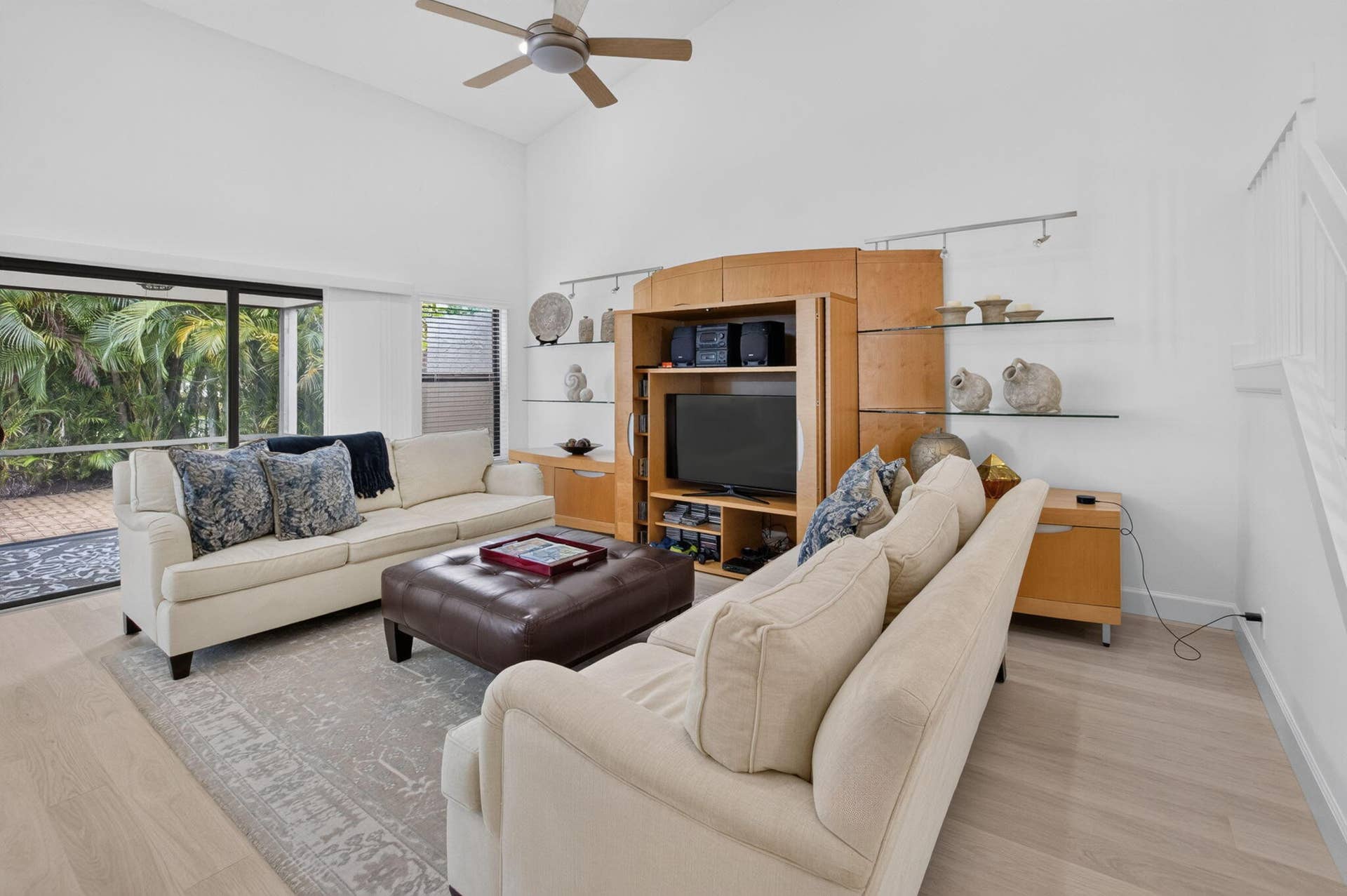 5576 Fox Hollow Drive, Boca Raton, FL 33486 LIVING ROOM WITH SLIDERS TO PATIO