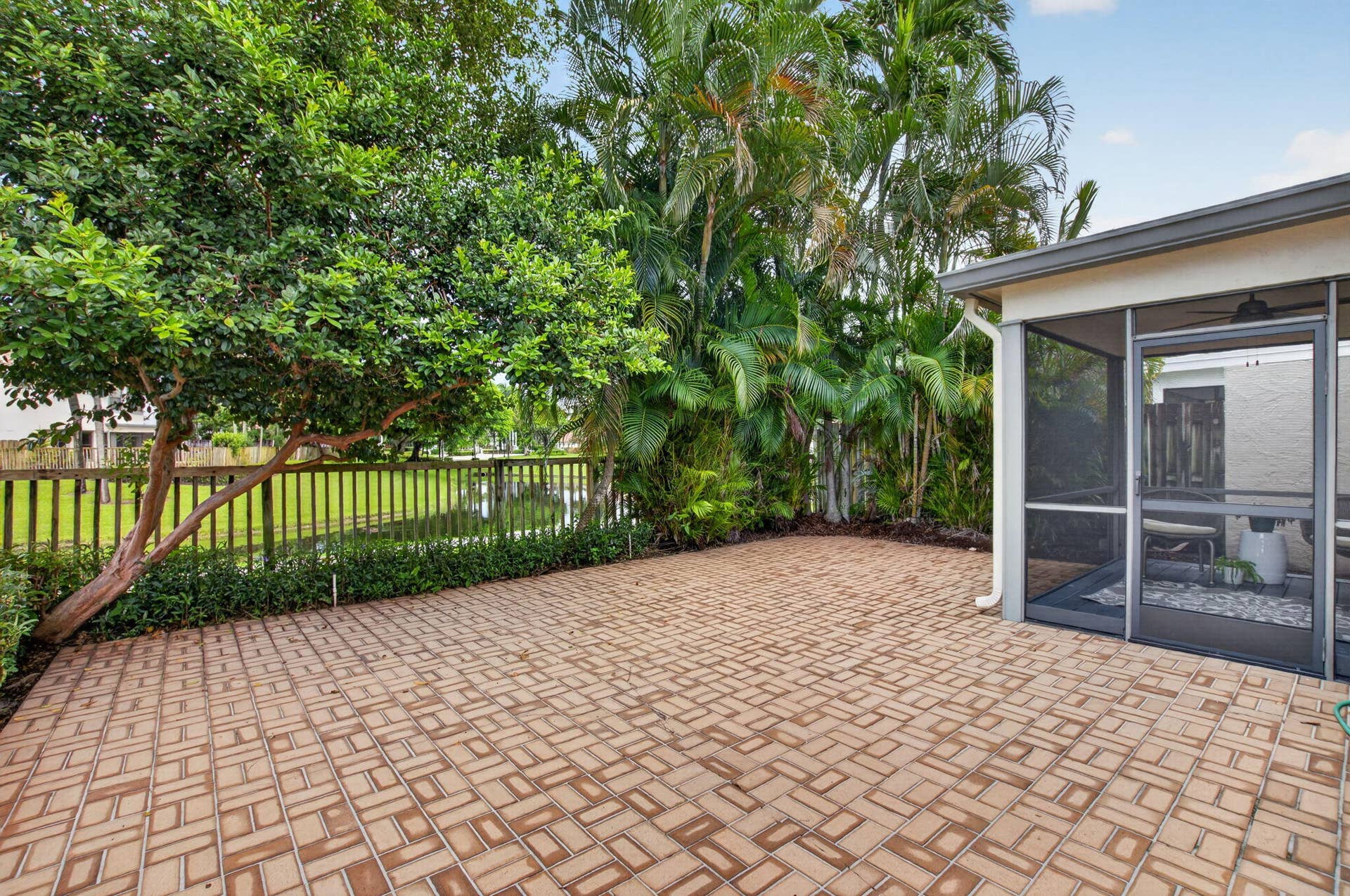 5576 Fox Hollow Drive, Boca Raton, FL 33486 SPACIOUS PATIO WITH LAKE VIEWS