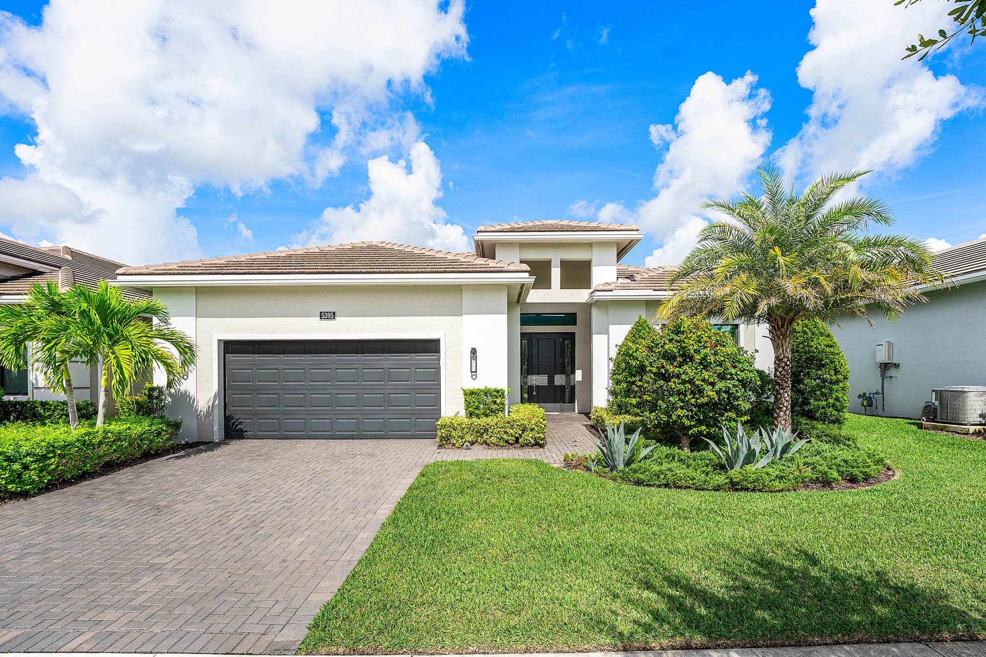 #1  Beautiful front exterior with lush
