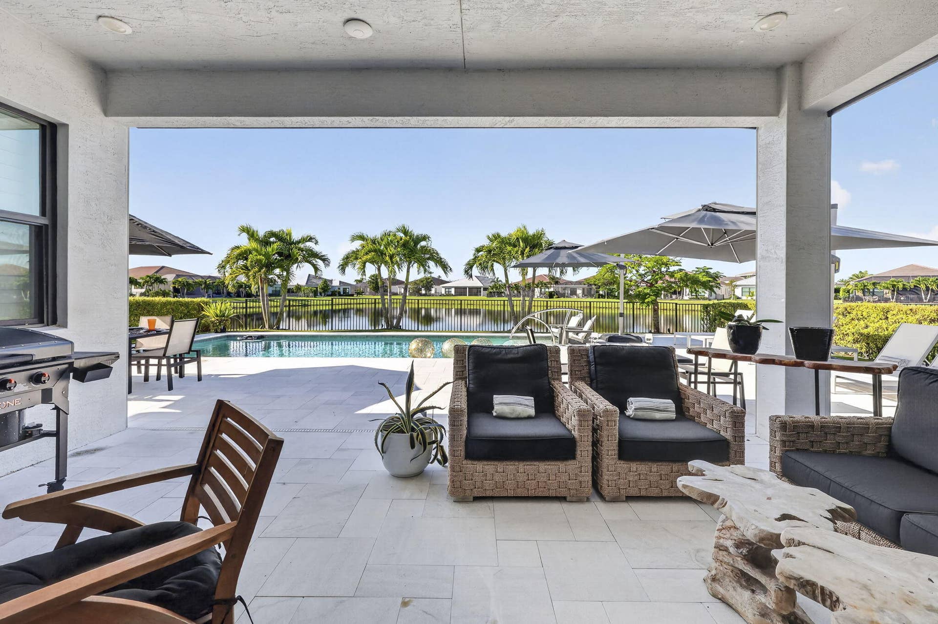 15730 Longboat Key Drive, Westlake, FL 33470 With electric screens