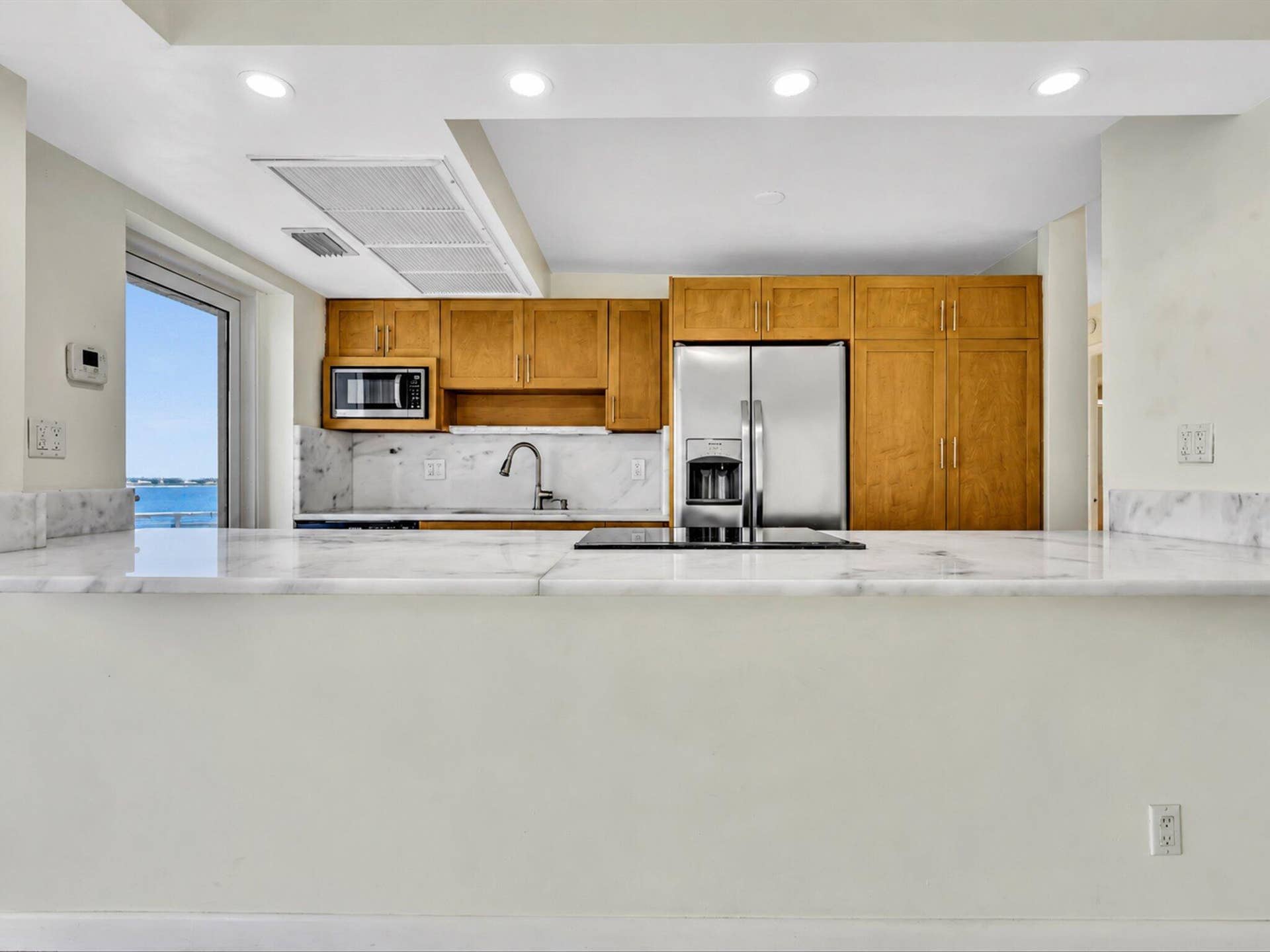 2841 N Ocean Boulevard, #1105, Fort Lauderdale, FL 33308 Opening from Kitchen to Living Area