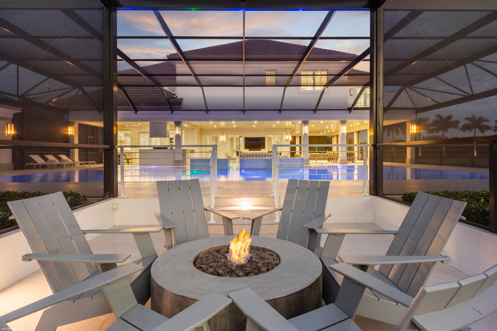 15527 Imperial Point Lane, Wellington, FL 33414 Outdoor fire pit at screened pool area