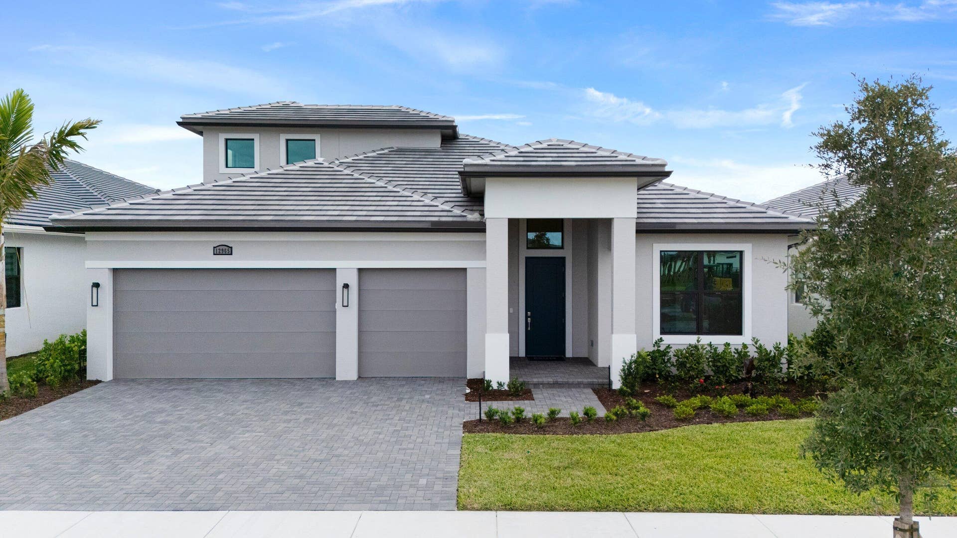 12965 SW LEOPOLD Way, Port St Lucie, FL 34987 Front Exterior
