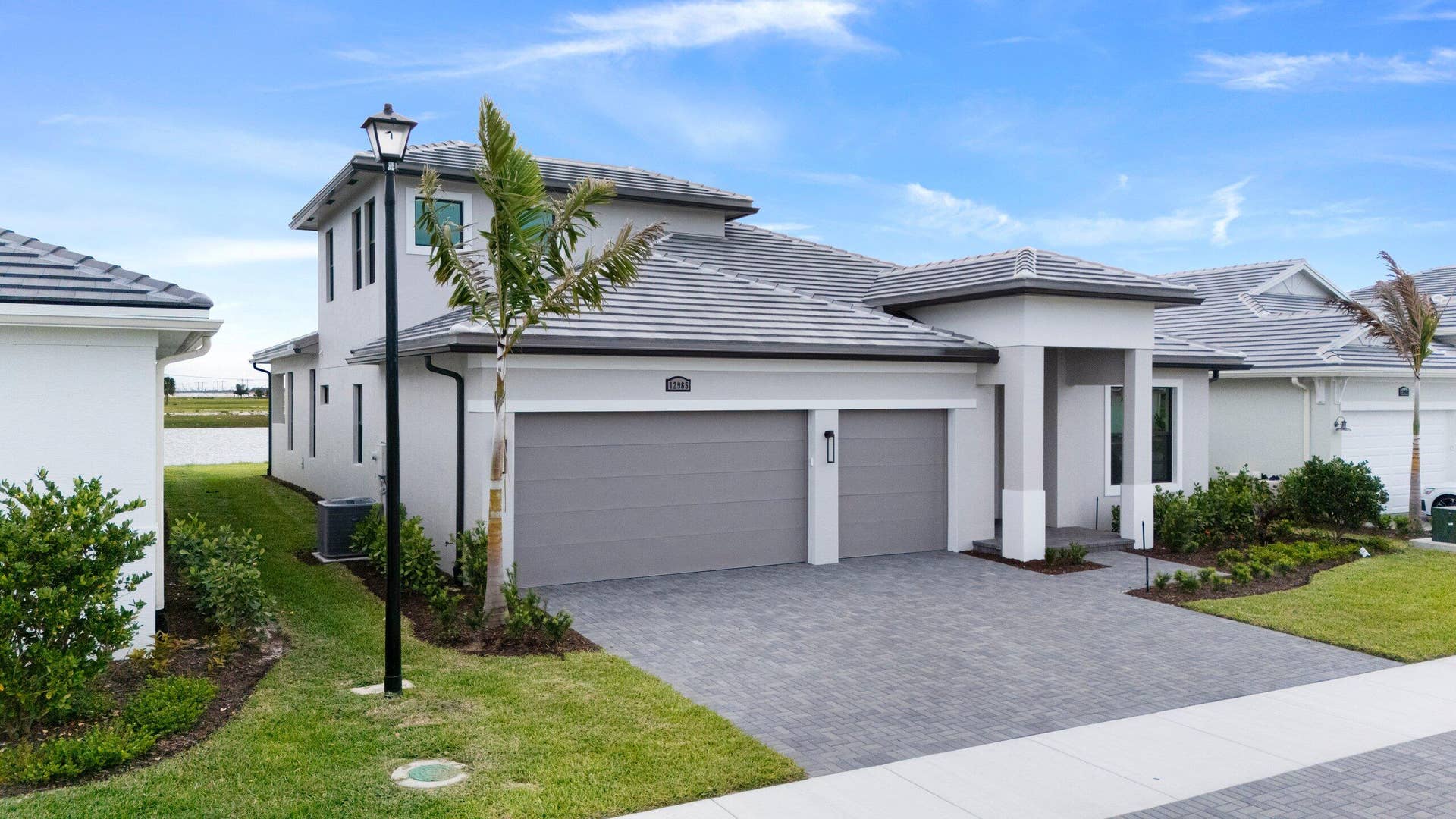 12965 SW LEOPOLD Way, Port St Lucie, FL 34987 Front Exterior