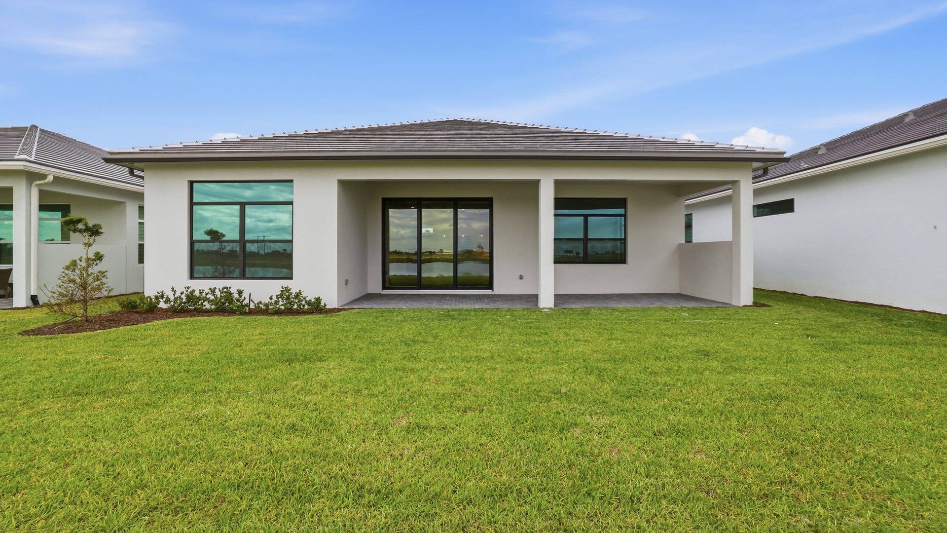 12965 SW LEOPOLD Way, Port St Lucie, FL 34987 Rear Exterior