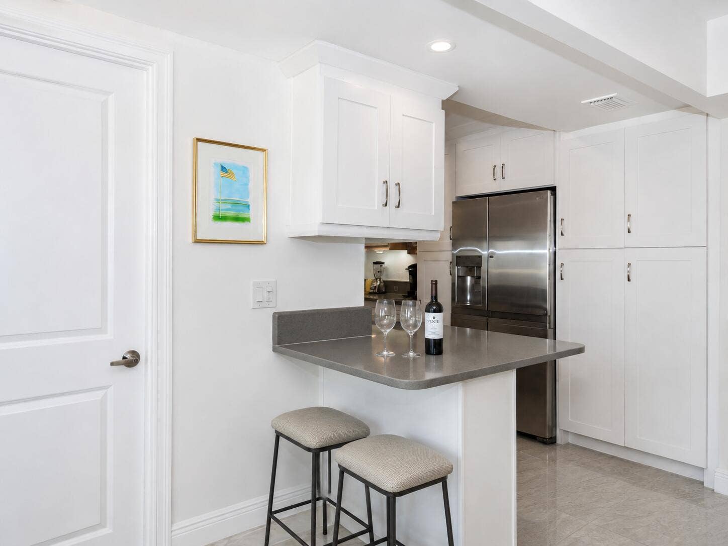 3450 S Ocean Boulevard, #7230, Palm Beach, FL 33480 723 kitchen with bar stools