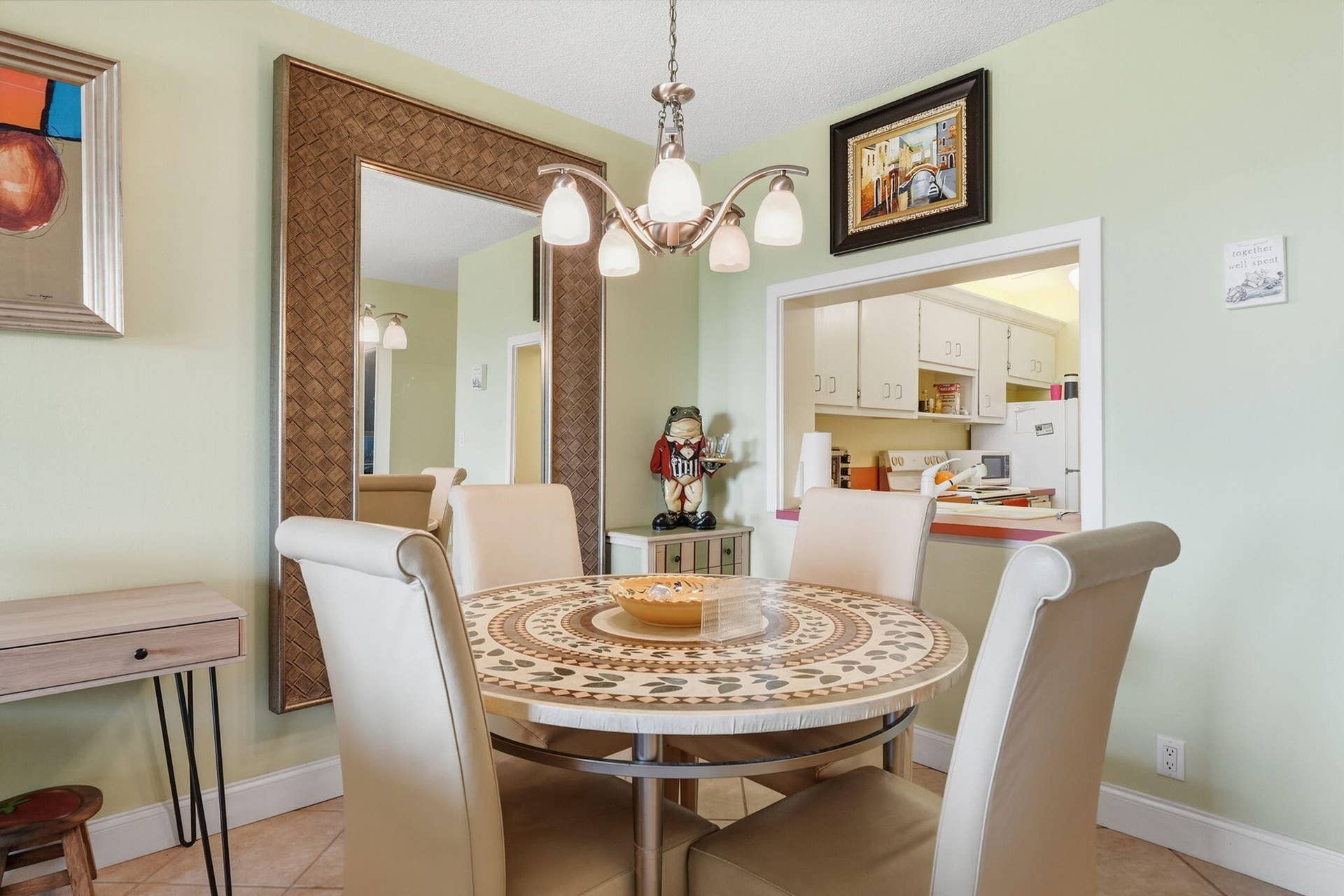 Recessed kitchen pass-through with a built-in counter
