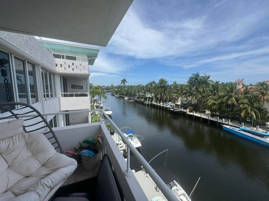 180 Isle Of Venice Drive, #433, Fort Lauderdale, FL 33301 Private balcony with metal railing, offering canal frontage and waterway access