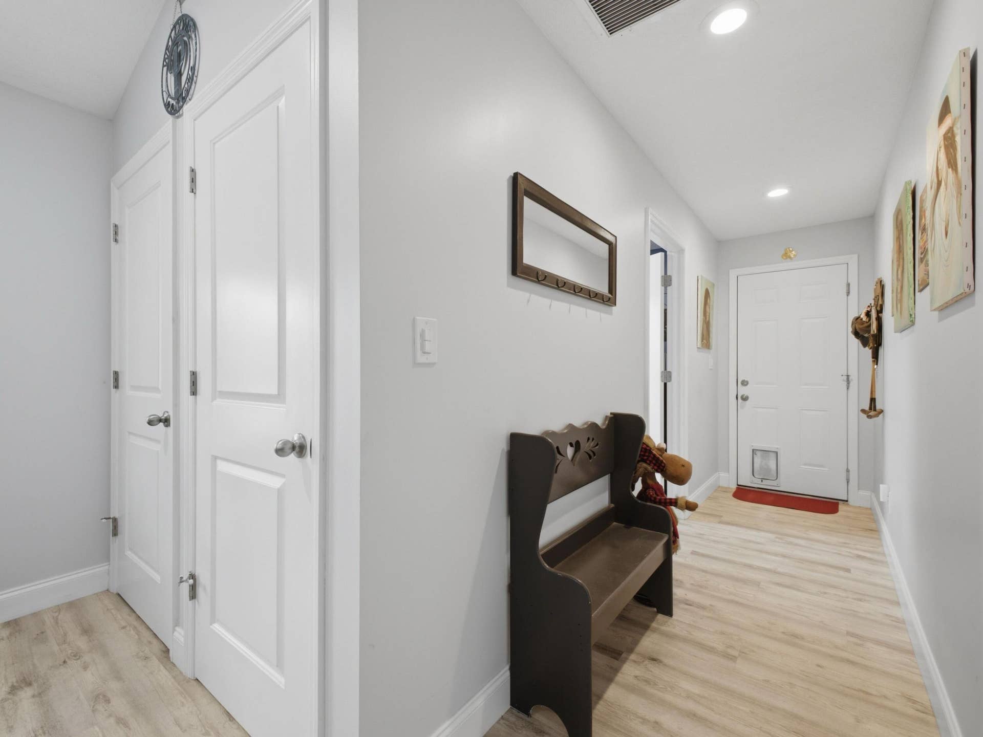 14171 BIDDEX Road, Loxahatchee Groves, FL 33470 Hallway to Laundry and Garage