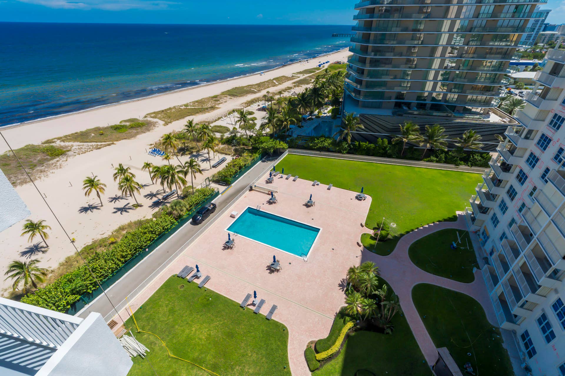Relax by the pool or step onto the beach-right outside your door!