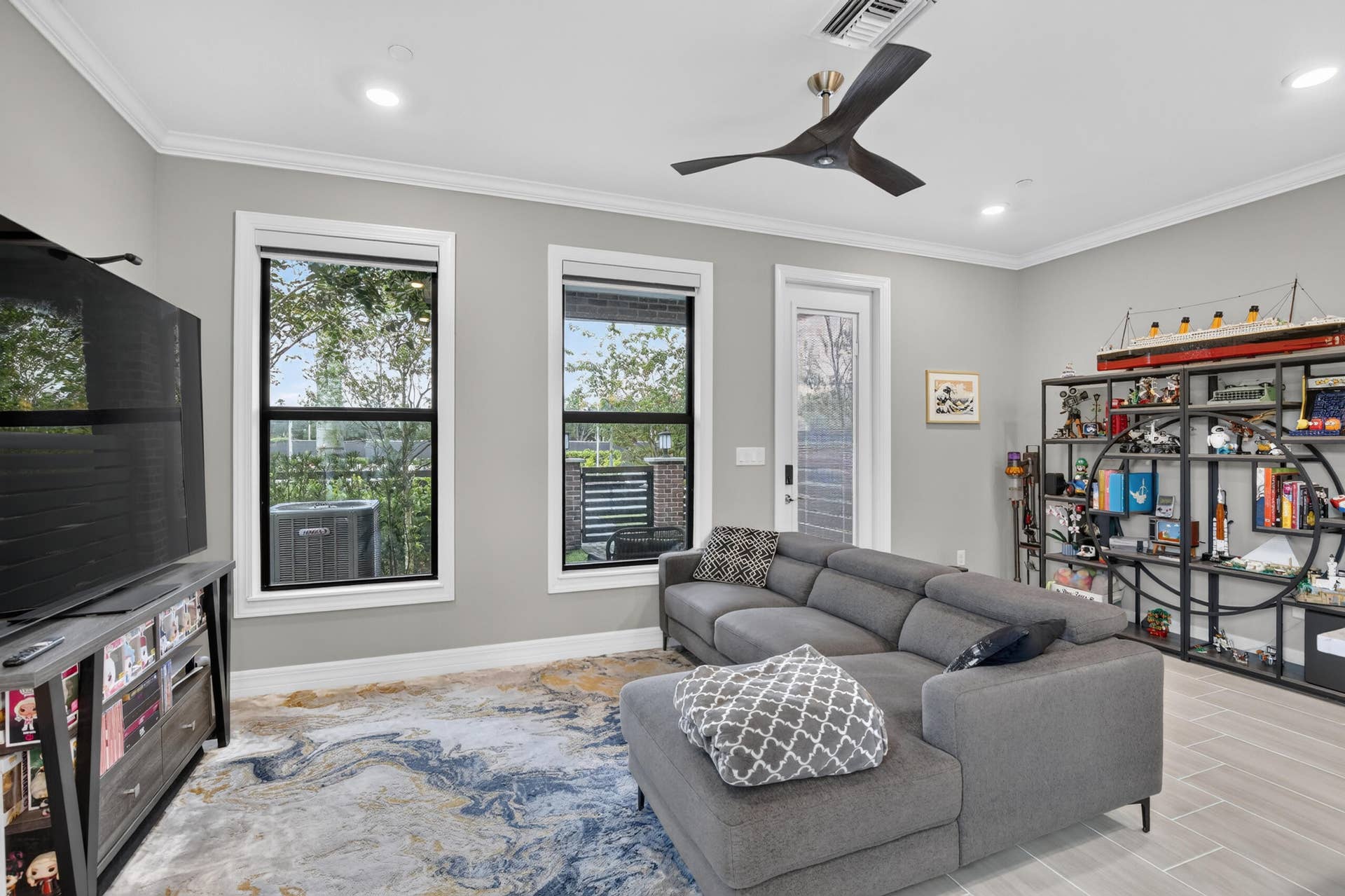 765 NW 84TH Terrace, Plantation, FL 33324 Recessed lighting illuminates the room, complemented by a modern ceiling fan