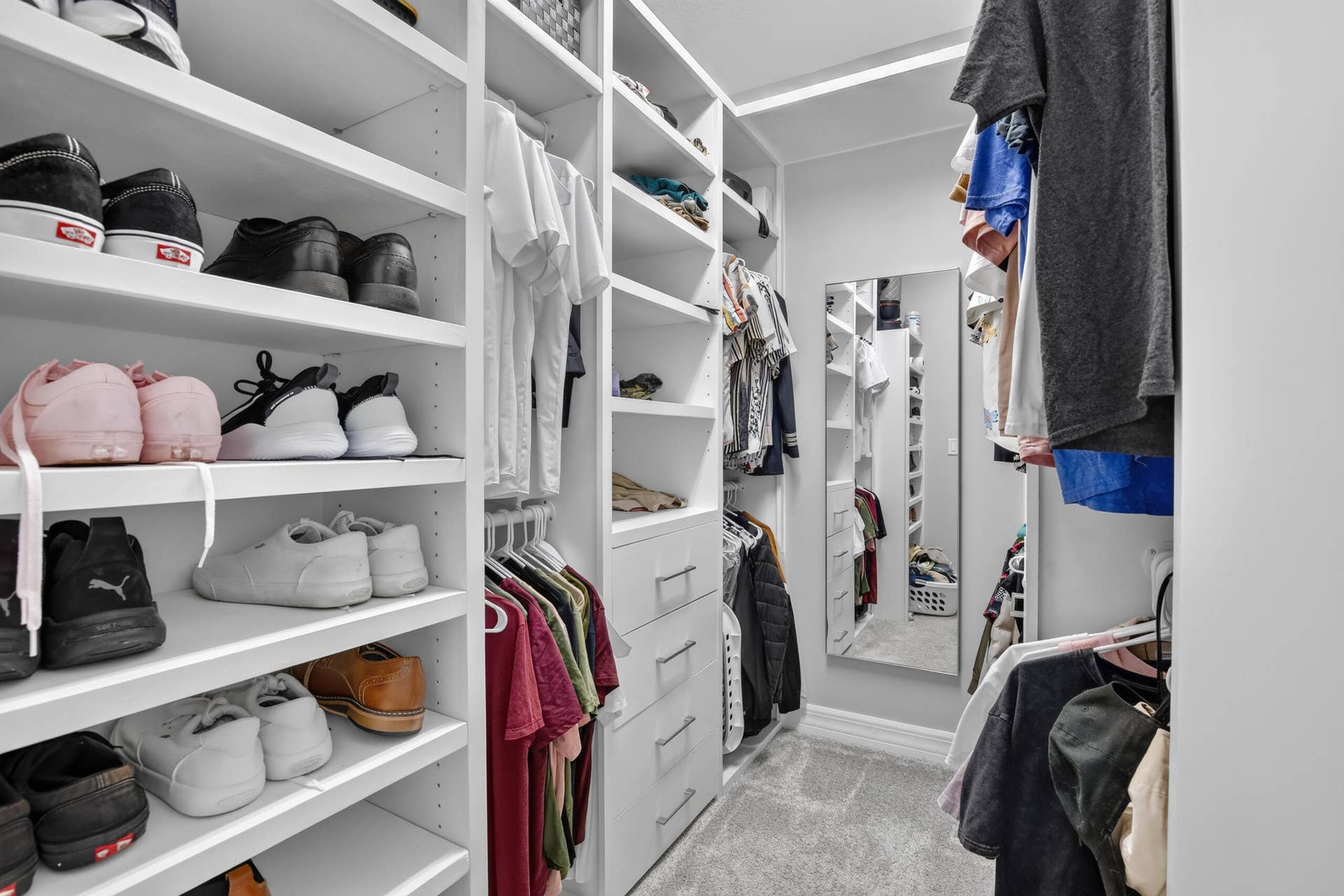 765 NW 84TH Terrace, Plantation, FL 33324 Built-in closet system with shelving, hanging rods, and drawers