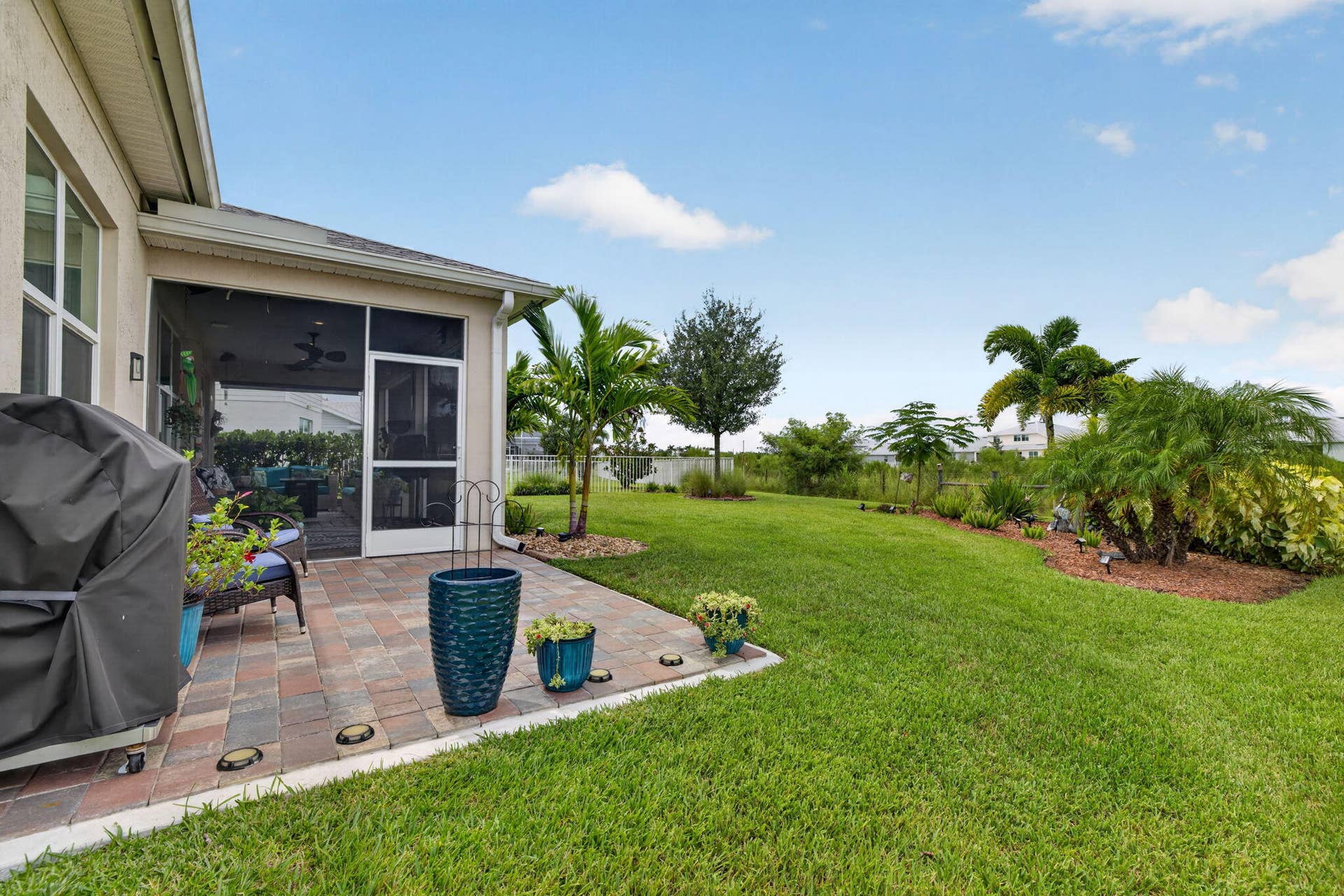 10521 SW CAPTIVA Drive, Port St Lucie, FL 34987 Patio Pavers Galore Preserve Peace