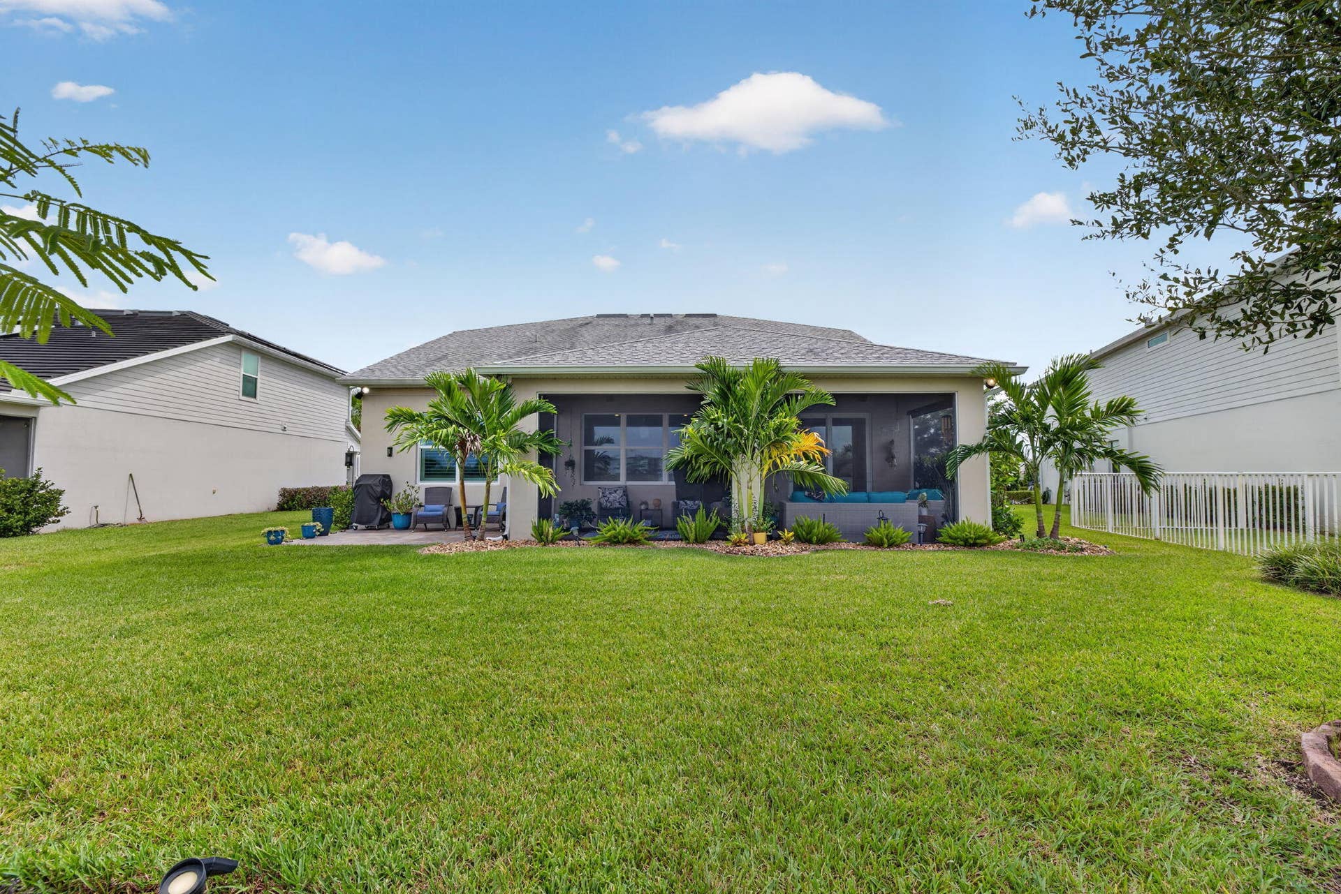 10521 SW CAPTIVA Drive, Port St Lucie, FL 34987 Full Length Paver 2/3 Screened Lanai
