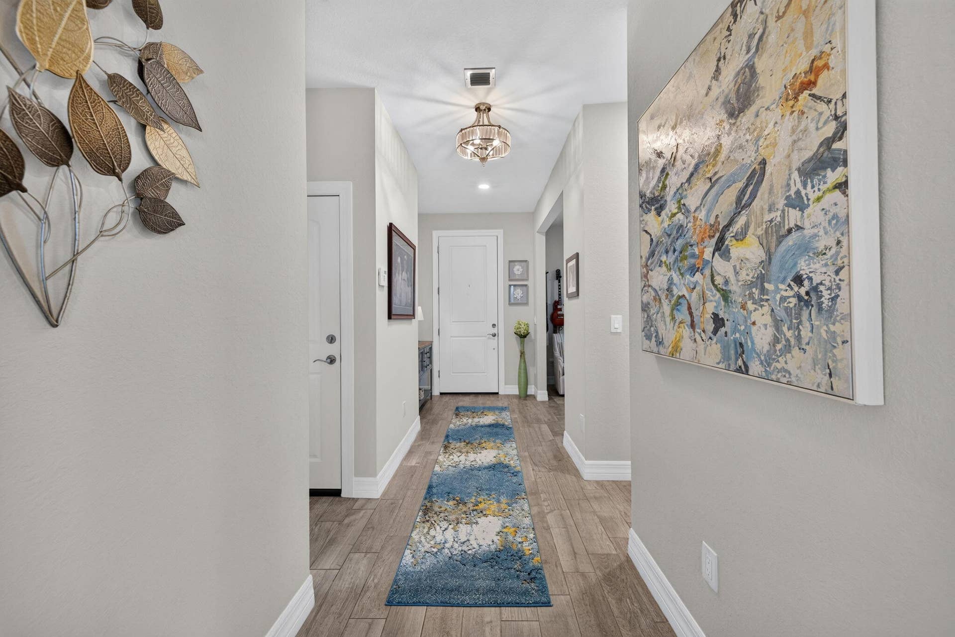 10521 SW CAPTIVA Drive, Port St Lucie, FL 34987 Wide Hall Makes a Statement