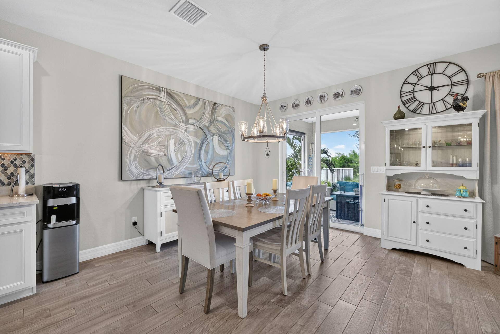 10521 SW CAPTIVA Drive, Port St Lucie, FL 34987 Dining Room Impact Sliders Lots of Light
