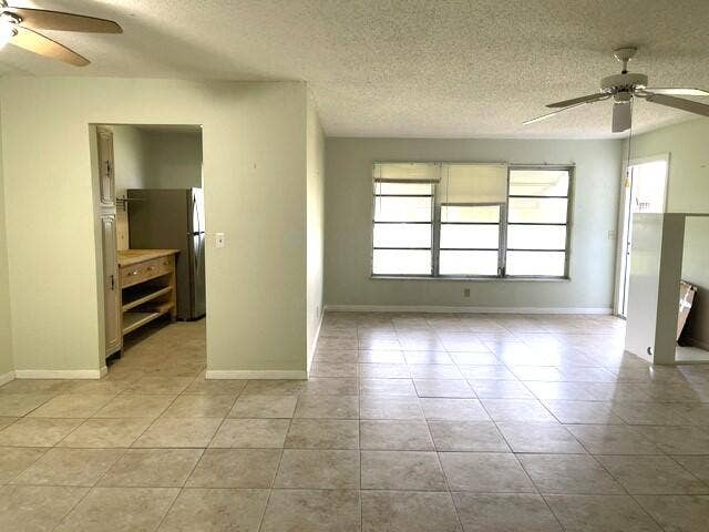 892 HIGH POINT Boulevard N, #B, Delray Beach, FL 33445 Living room and kitchen view