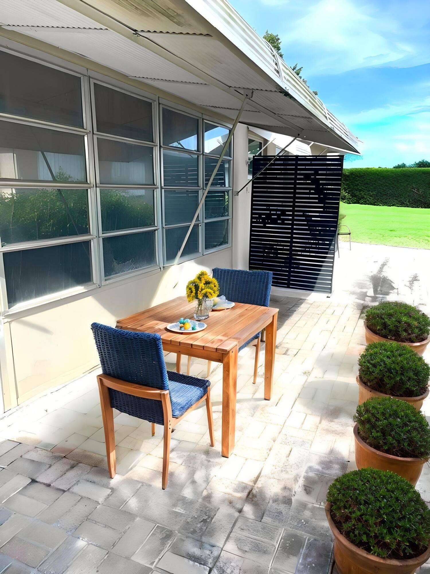 892 HIGH POINT Boulevard N, #B, Delray Beach, FL 33445 Back-yard-patio - Outdoor - Coastal - AI