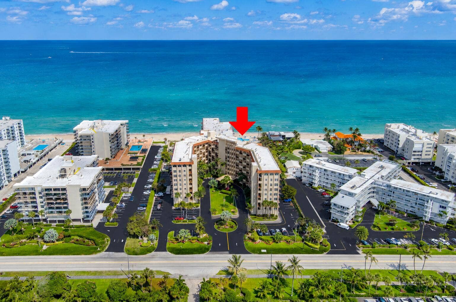 3475 S OCEAN Boulevard, #2050, Palm Beach, FL 33480 Beachfront multi-story building featuring a U-shaped design, a central green space, and direct beach access