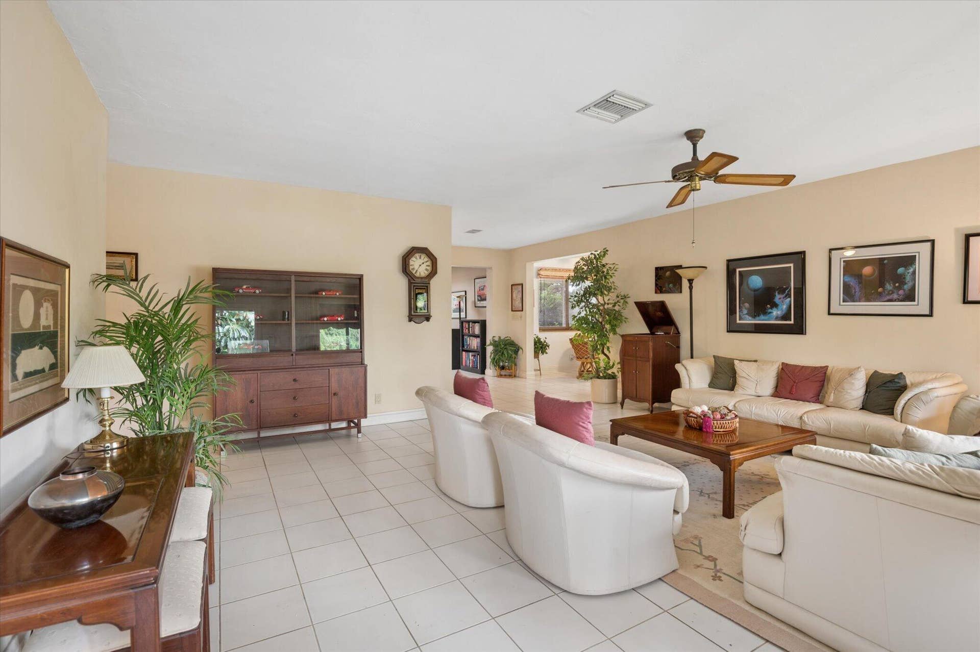 4120 SW 1ST Court, Plantation, FL 33317 Living room. Dining room, kitchen, and back addition to the right. Two bedrooms to the left.