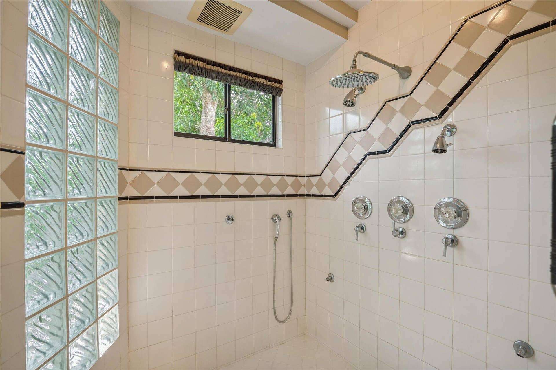 4120 SW 1ST Court, Plantation, FL 33317 Spacious shower in back primary bathroom with it's own, dedicated water heater