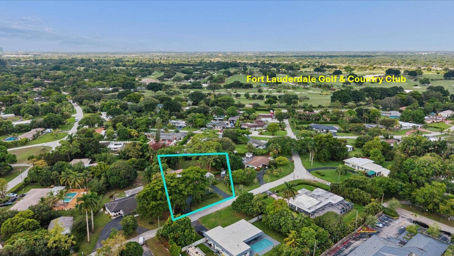 4120 SW 1ST Court, Plantation, FL 33317 Aerial view with Fort Lauderdale Country Club on the horizon. Walk to linear park around golf course.