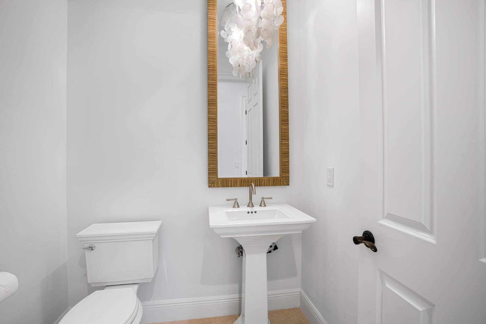 HALF BATH WITH PEDESTAL SINK AND DESIGNER TOUCHES