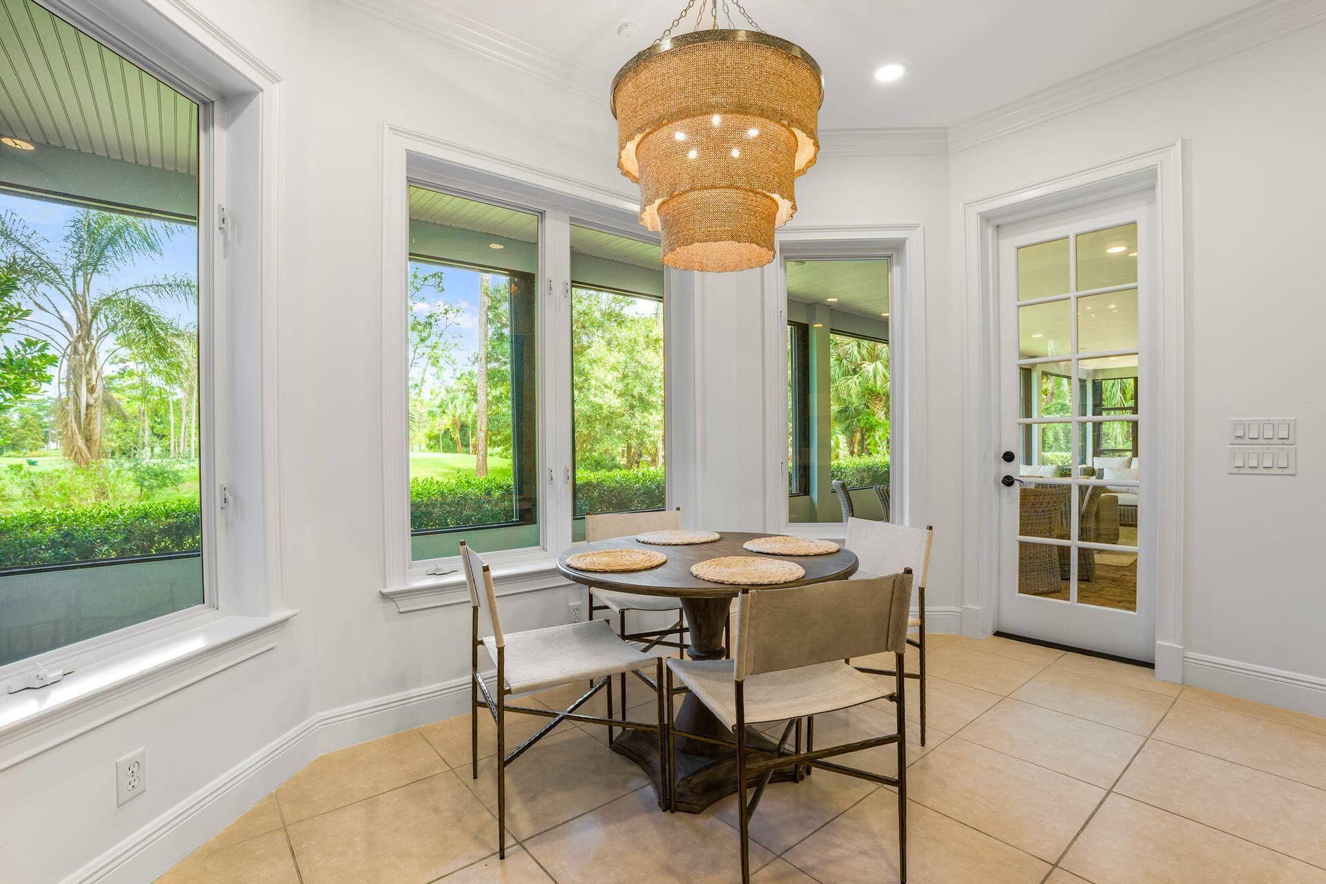 LIGHT FILLED BREAKFAST NOOK WITH SERENE GOLF COURSE VIEWS