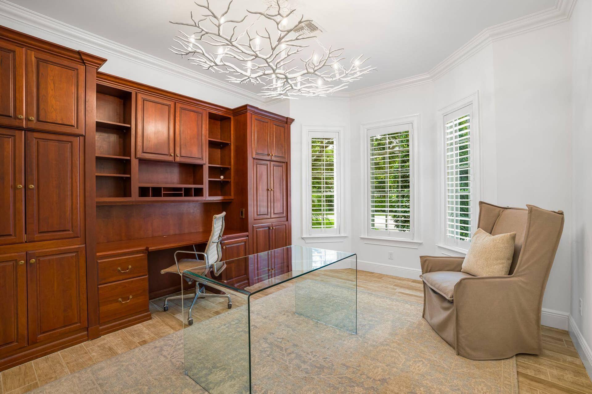 PRIVATE HOME OFFICE WITH CUSTOM BUILT- INS AND ABUNDANT NATURAL LIGHT