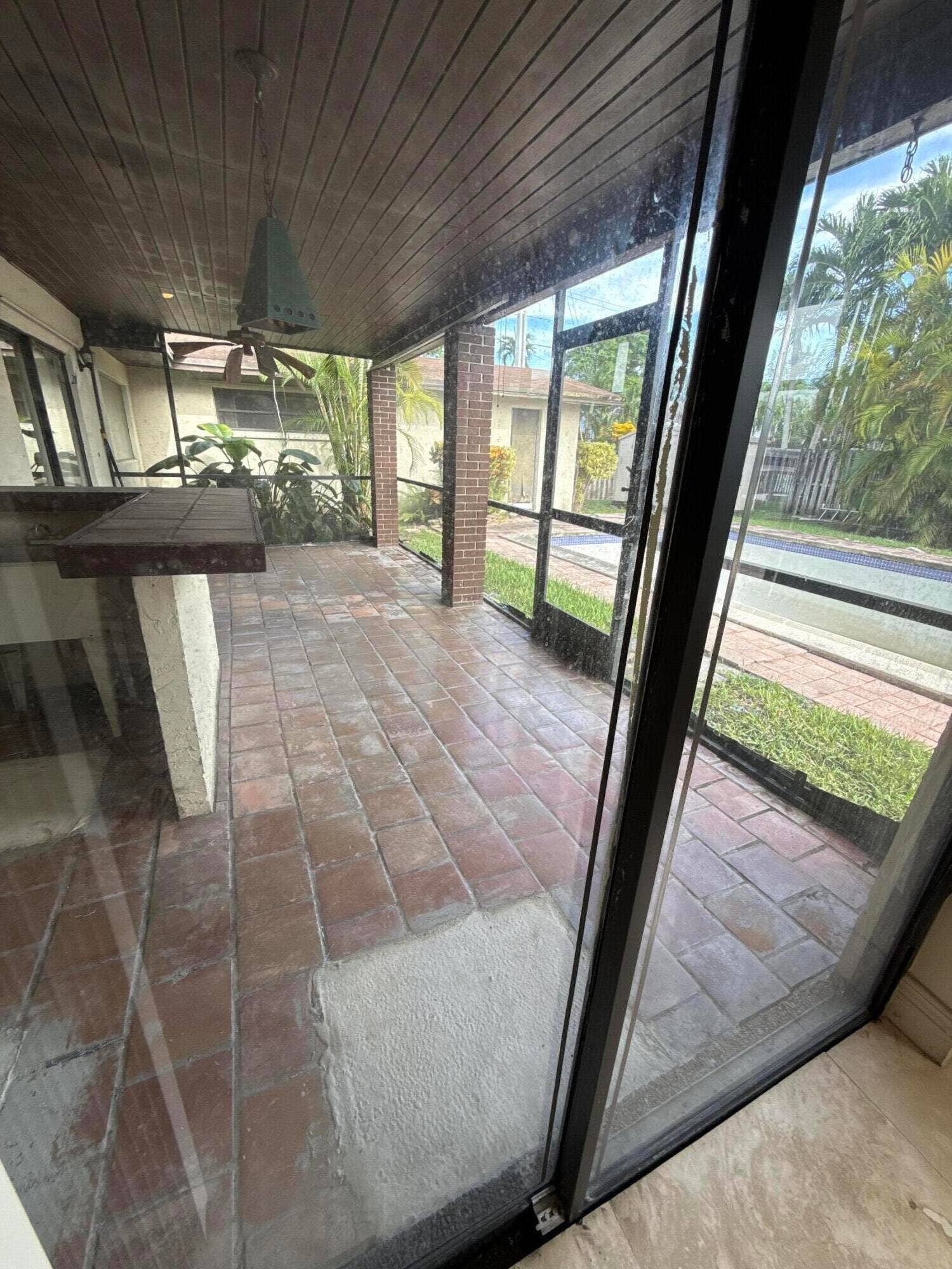 2390 NE 199th Street, Aventura, FL 33180 Enclosed Patio overlooking the pool