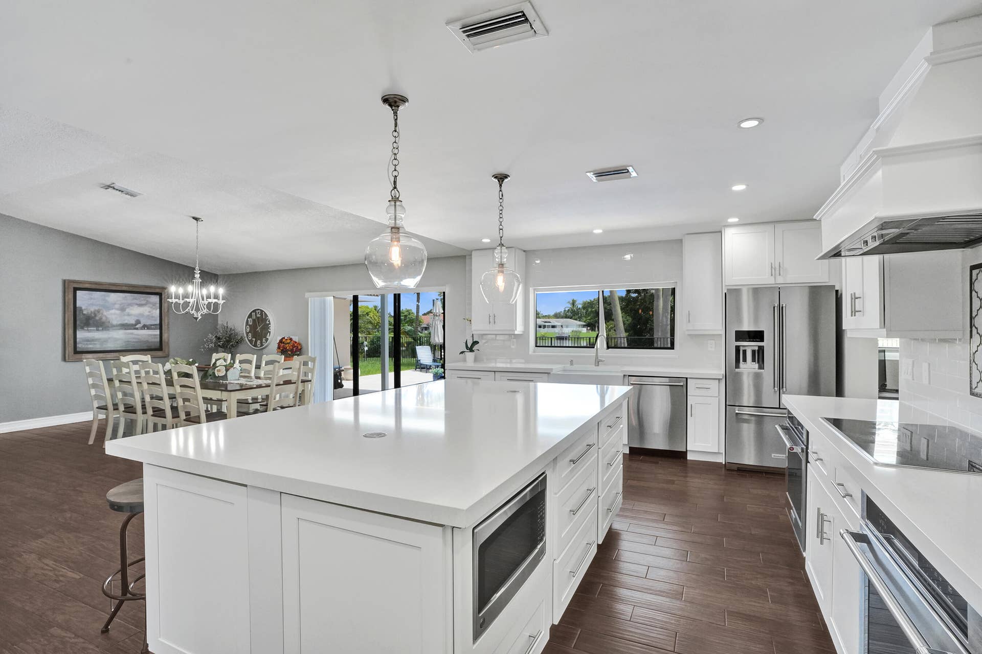 12072 NW 27TH Drive, Coral Springs, FL 33065 View of the pool and lake from kitchen