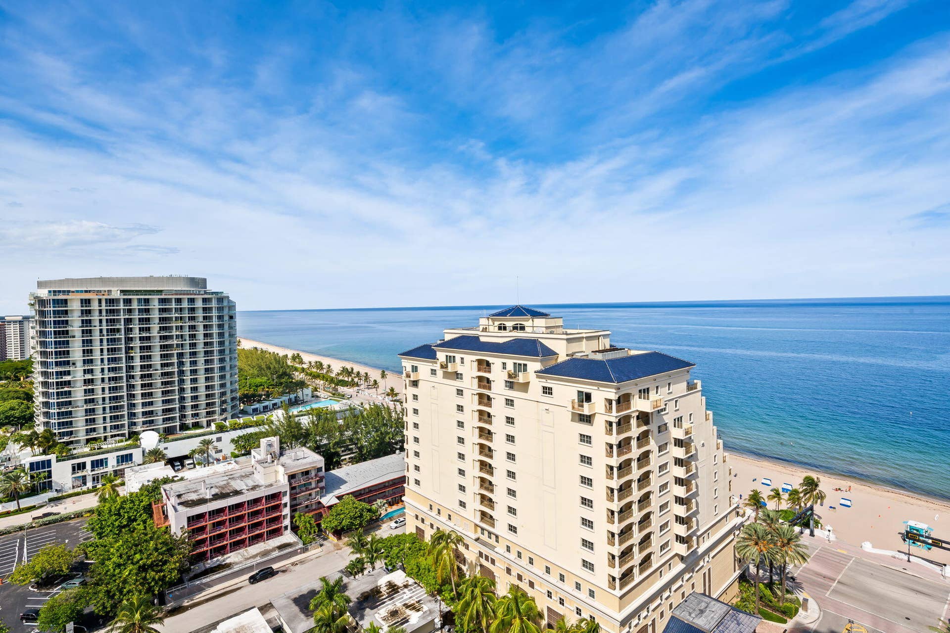 551 N FORT LAUDERDALE BEACH Boulevard, #R1801, Fort Lauderdale, FL 33304 Expansive ocean and coastline scenery, with multiple high-rise buildings featuring balconies