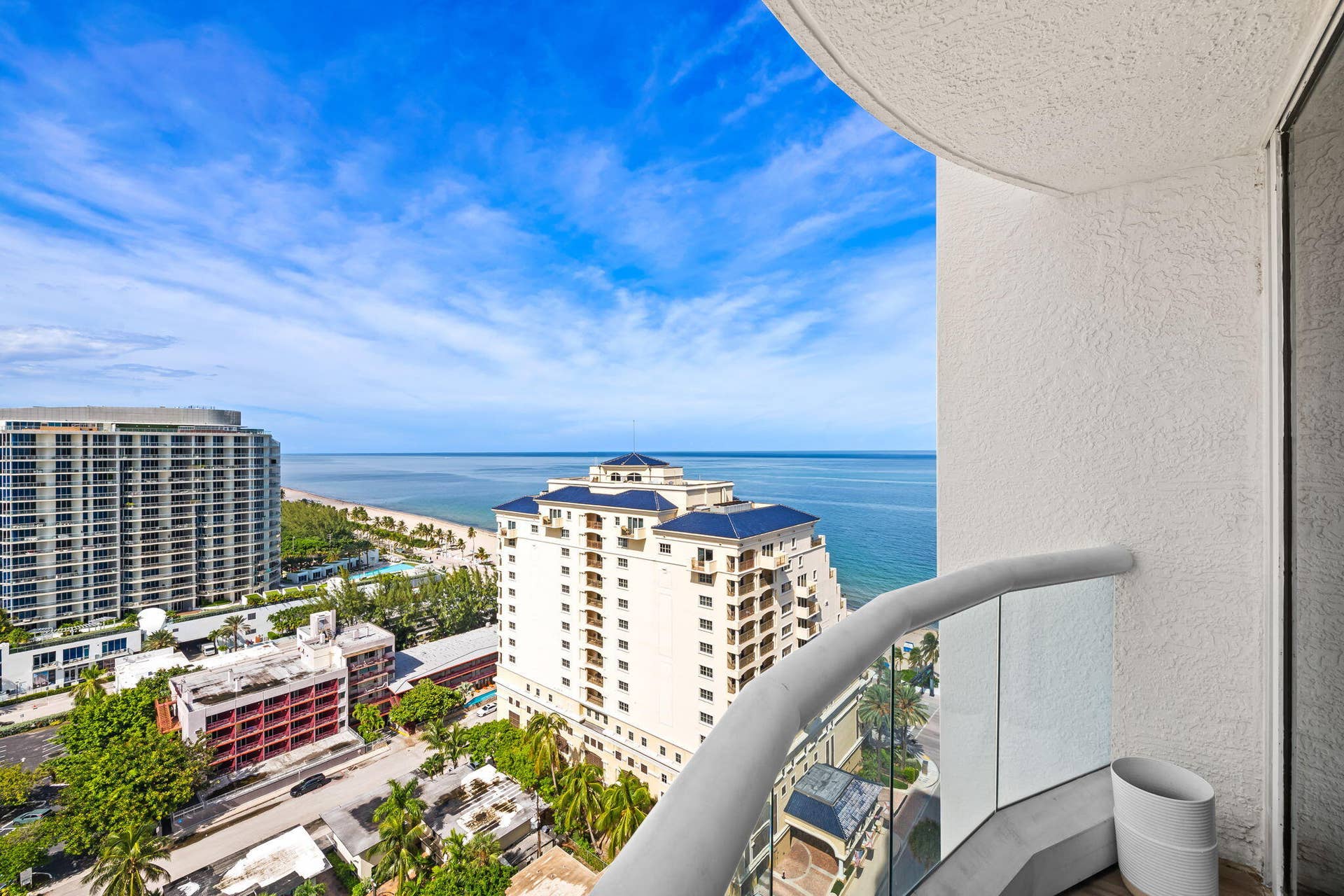 551 N FORT LAUDERDALE BEACH Boulevard, #R1801, Fort Lauderdale, FL 33304 Curved balcony with glass railing, providing panoramic ocean and city views