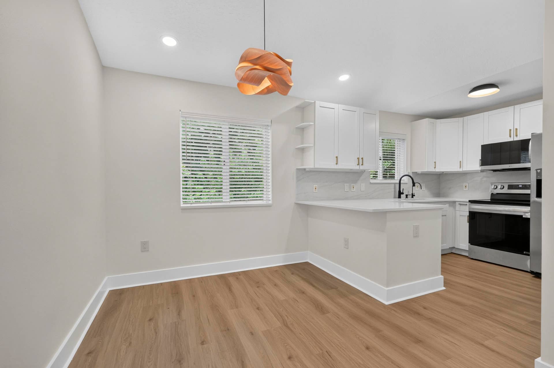 3496 BRIAR BAY Boulevard, #206, West Palm Beach, FL 33411 Dinning Room and Kitchen View