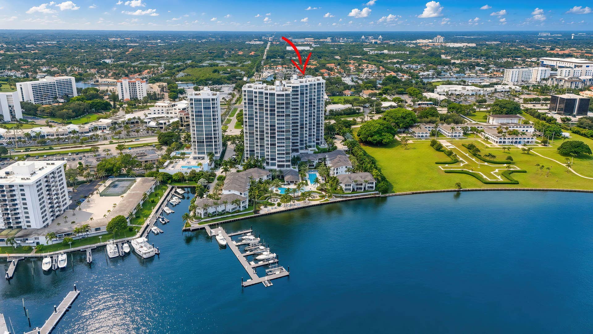 1 Water Club Way, #503, North Palm Beach, FL 33408 Marina with multiple boat slips, adjacent to a high-rise building with extensive landscaping, a swimming pool, clubhouse, fire pit, private "beach" area, 100% Resort -style living!