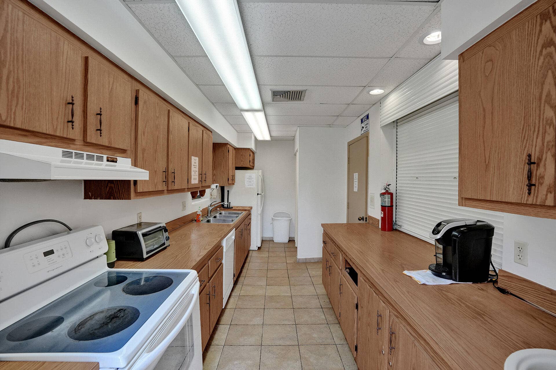 4570 NW 18th Avenue, #206, Deerfield Beach, FL 33064 Clubhouse kitchen