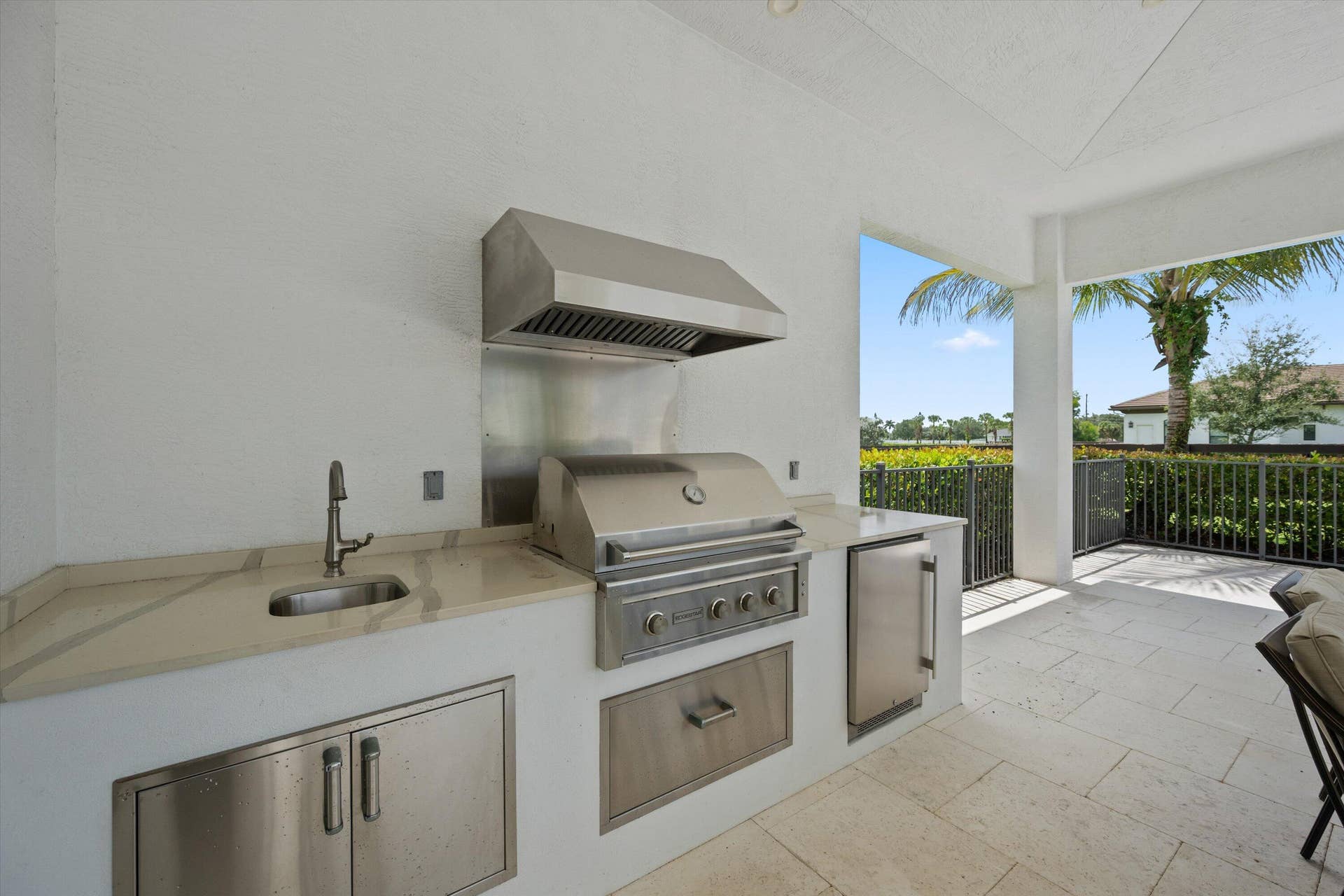843 STALLION Drive, Loxahatchee, FL 33470 Deep porches and large outdoor kitchen