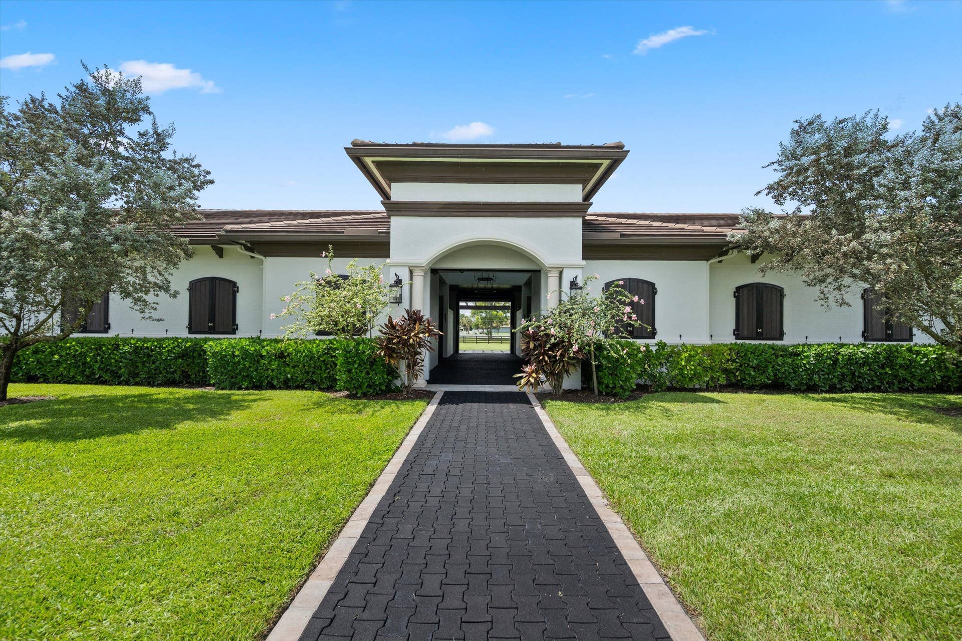 843 STALLION Drive, Loxahatchee, FL 33470 Rubber brick path to barn