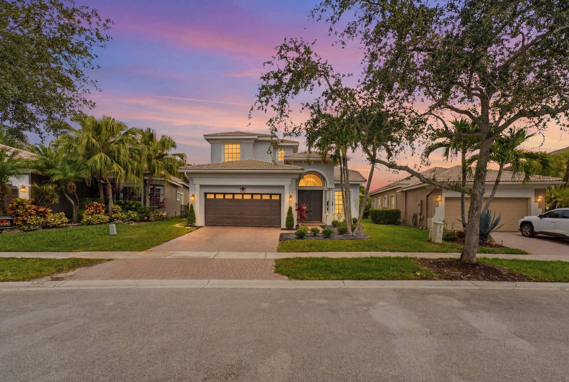12339 NW 77TH Manor, Parkland, FL 33076 JAC06202_twilight_96772da9