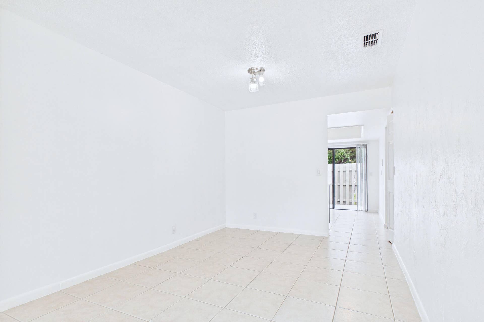 Tile flooring and white walls