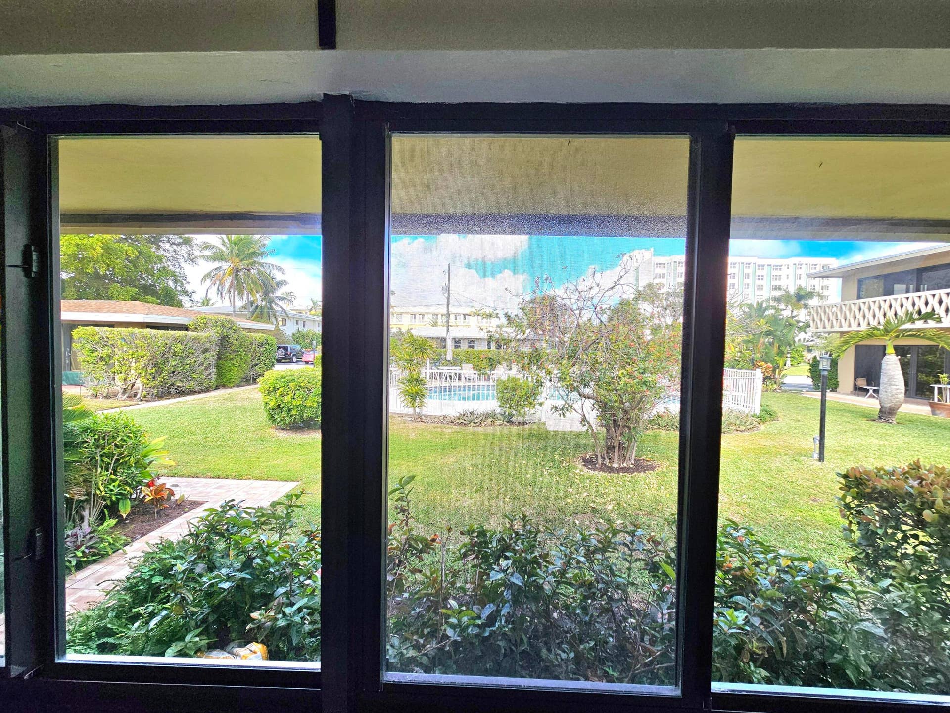 IMPACT WINDOWS WITH A VIEW OF THE POOL